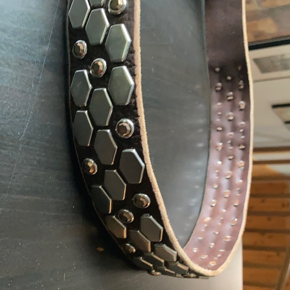 Dark brown and silver heavily studded western belt